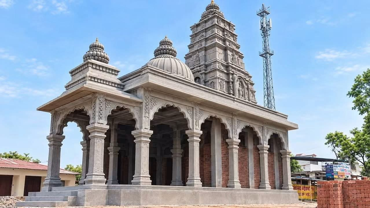 Carved stone temple with pillars and towers
