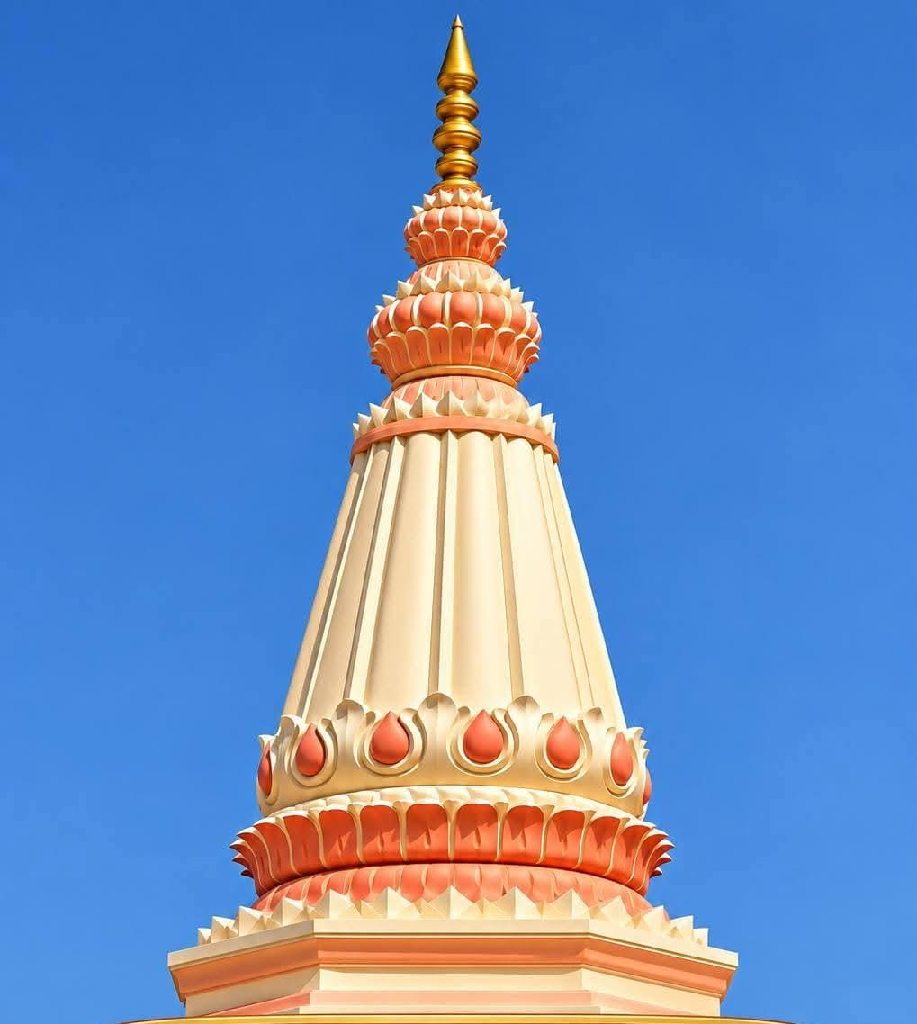 Temple shikhar against blue sky